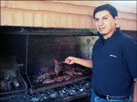 Tending the asado is Gustavo Chaparro
