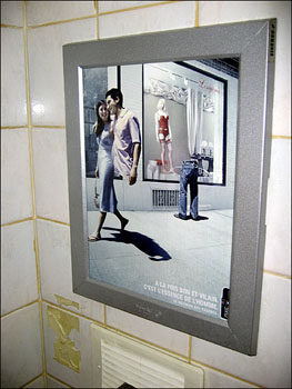 This ad in the underground for Axe squeeze spray deodorant caught Willie's eye.