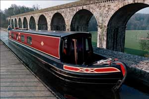 Narrowboat. Chirk Aqueduct, with the Chirk (railway) Viaduct as a backdrop